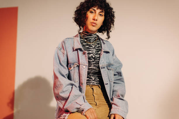 istock Confident young woman looking at the camera 1401358519