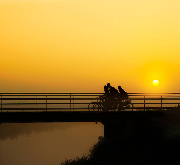 Sunset landscape with people silhouettes at coastline.Istanbul - Turkey.