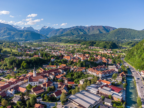 Drone Shot Of A Beautiful Old Town Surrounded By Lush Green Mountain Landscape At Kamnik, Slovenia
