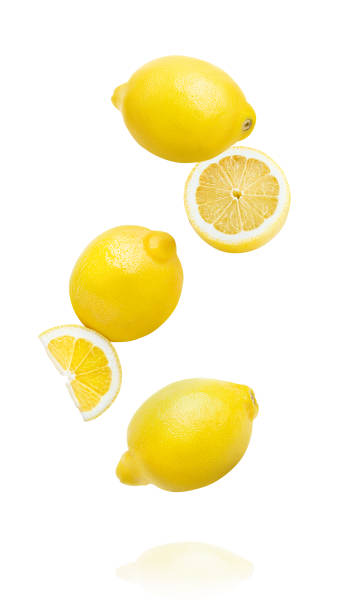 istock Falling lemon fruits isolated on white background 1401364572