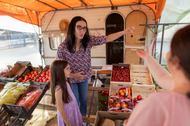 istock Small family business with fruit and vegetables 1401364656