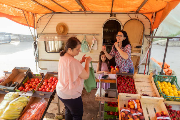 istock Happy female seller serving customer 1401364782