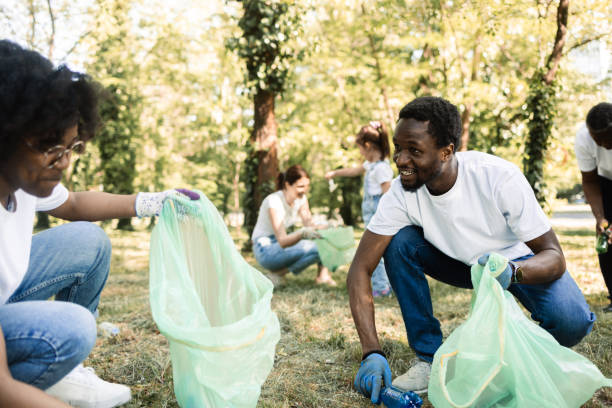 istock Group of people gathered to clean their park from waste 1401367524