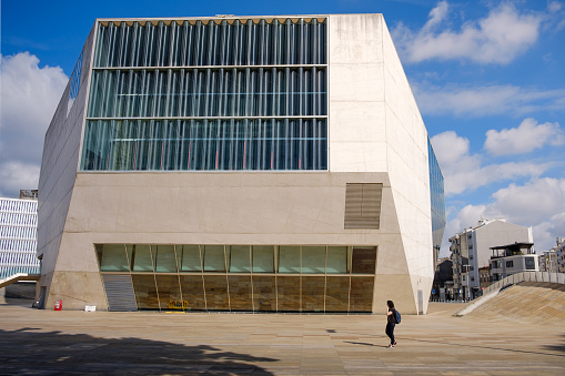 Porto , Portugal; 05 june 2022: General view of Music House in Porto; A person is passing by
