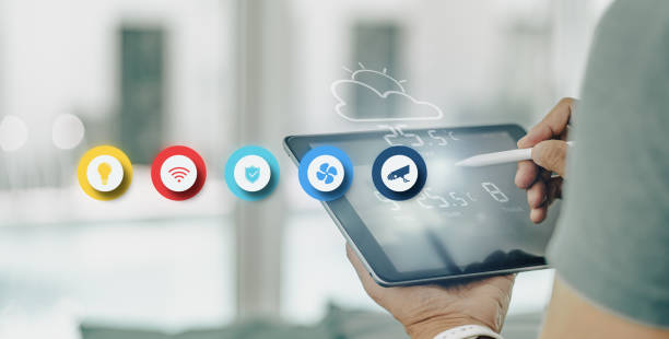 istock A man manages smart home automation, monitoring, and security with his tablet computer 1401368721