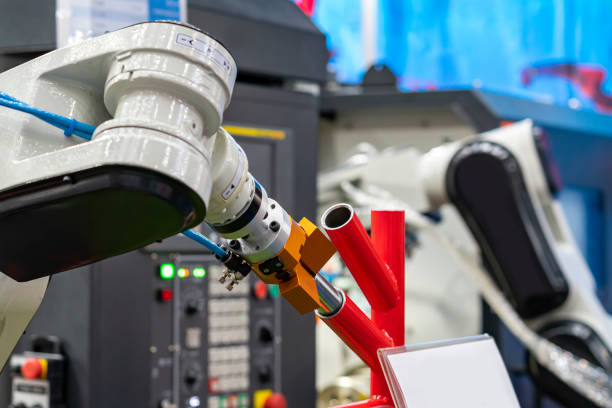 istock high technology & precision robot grip with automatic clamp or chuck for catch workpiece or parts for remove or assembly in manufacturing process 1401370009