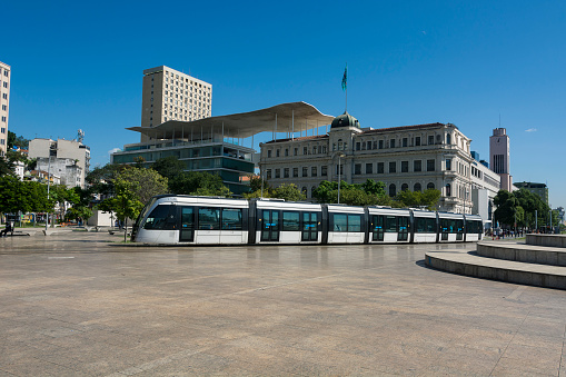 Mauá Square, Rio de Janeiro, Brazil. Modern tram passing through Mauá square. In the background the building of the Museum of Art of Rio - MAR.