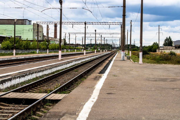 istock Railway tracks along the old fence 1401378947