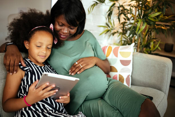istock Mother and daughter at home 1401379015