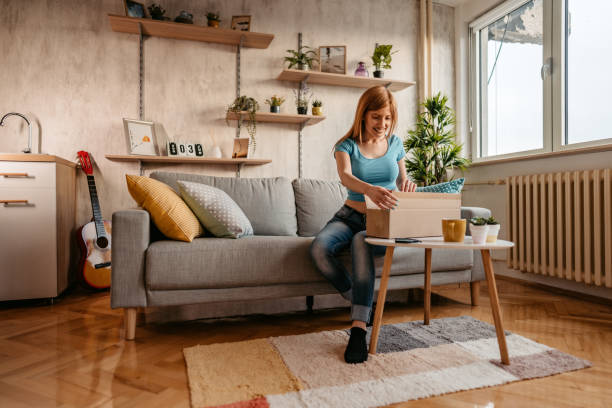 istock Woman customer opening cardboard box parcel 1401381953