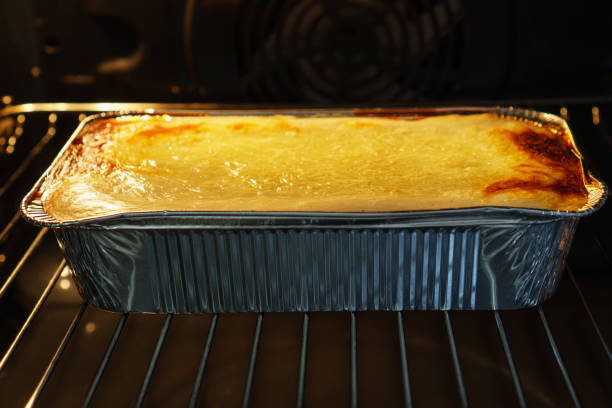 istock Italian lasagne casserole is in the oven. 1401385833