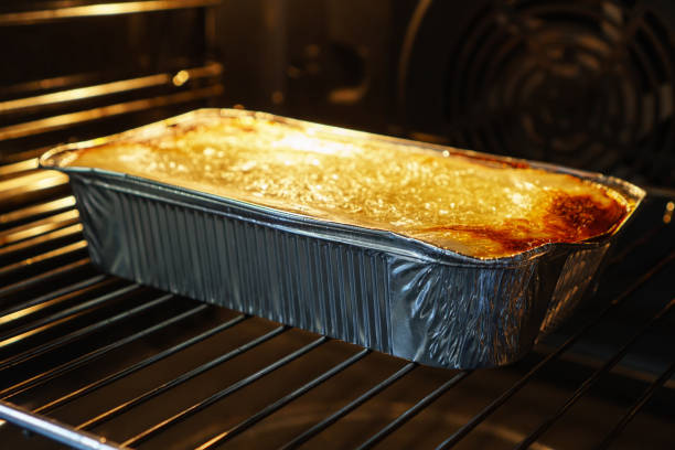 istock Italian lasagne casserole is in the oven. 1401385836