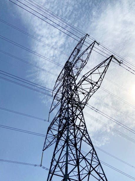 istock High voltage towers with sky background, high voltage transformer 1401388400