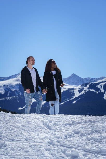 istock Young Couple Out for a Mountain Stroll 1401388709