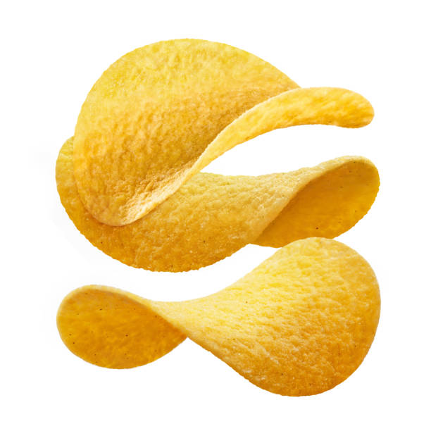 istock Three delicious potato chips close-up on white 1401390548