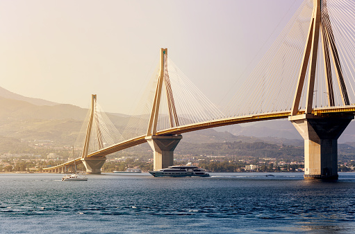 View on Rion-Antirion bridge - the longest cable-stayed bridge in the world with a continuous overhead surface with a length of more than two kilometers (region Achaea, Greece).