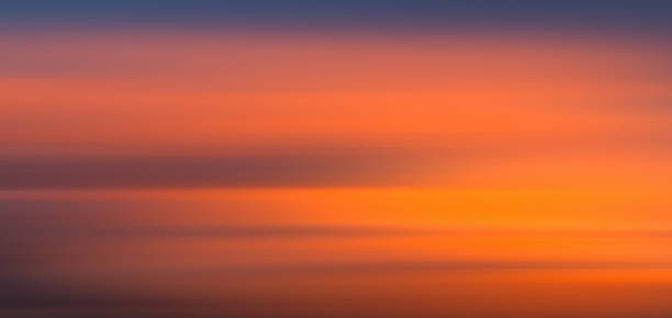 Colorful cloudy sky at sunset. Gradient color. Sky texture, abstract nature background motiom blur.