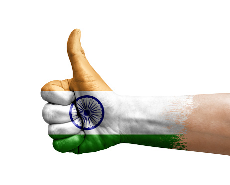 Hand making thumb up painted with flag of india