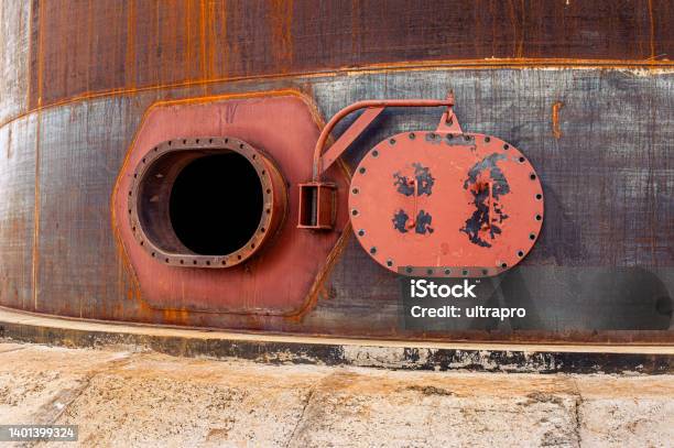 Opened Rusty Manhole On The Fuel Tank Shell Storage Tank Stock Photo - Download Image Now