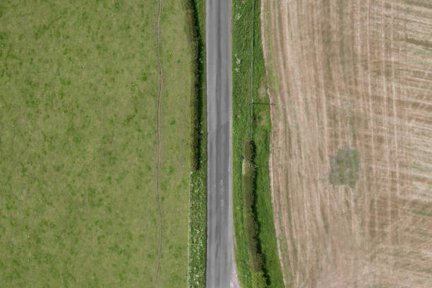 istock View from a drone flying above a country road 1401402079