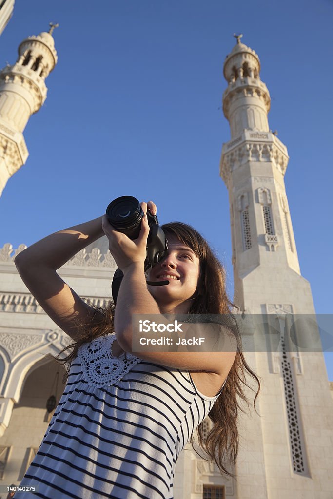 Travel photographer with digital camera Travel photographer with digital camera  at  travel destination Activity Stock Photo