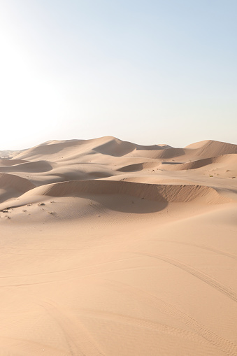 Desert dunes at sunset with scenic view