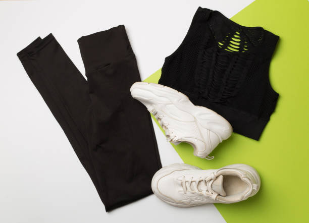 istock Flat lay composition with sport clothes on color background, top view 1401405208