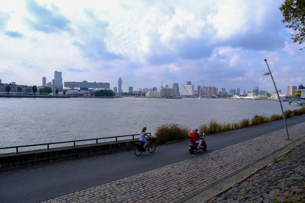 A man rides an electric scooter in Rotterdam, Netherlands on September 25, 2021.
