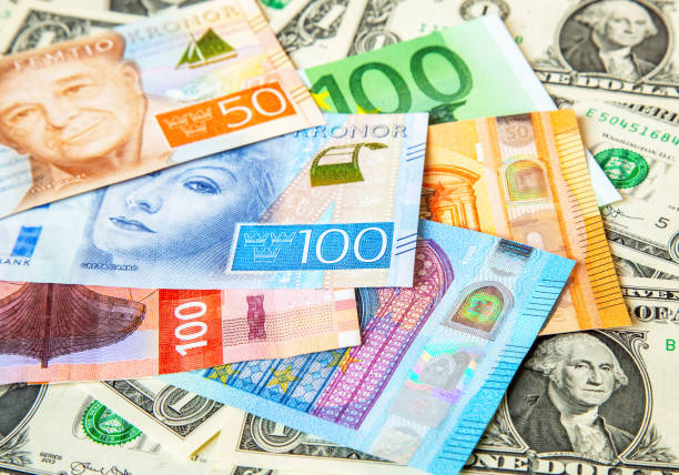 istock Background from banknotes of various currencies 1401415043