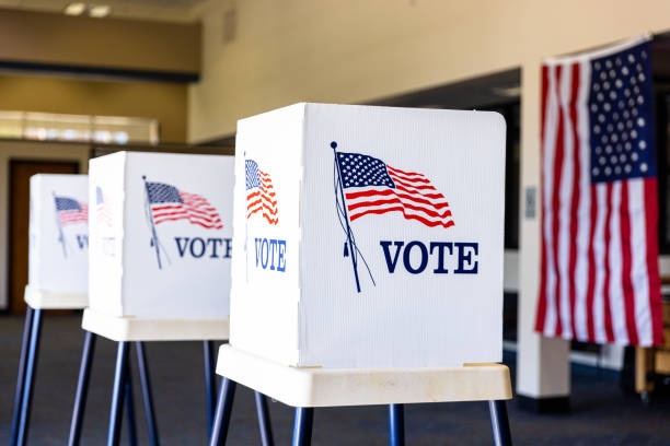Empty Voting Booths On Election Day Voting Booths set up in rows on Election Day ballot box photos stock pictures, royalty-free photos & images