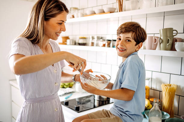 istock Boy helps his mother 1401415489