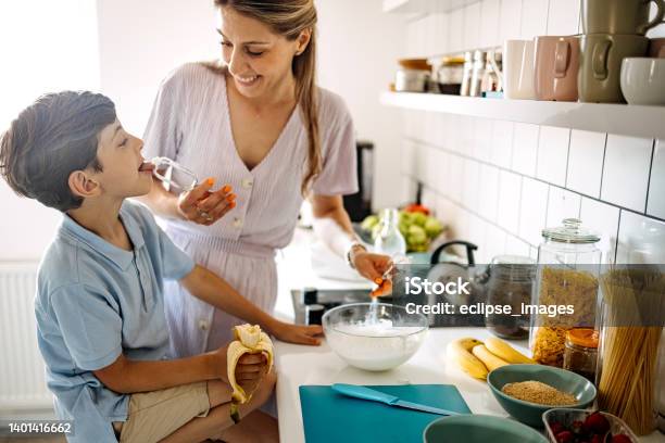 Its Tastes So Good Stock Photo - Download Image Now - 35-39 Years, 6-7 Years, Adult