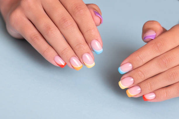istock Female hands with colourful manicure nails 1401419447