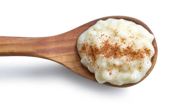 istock wooden spoon of rice pudding 1401419492