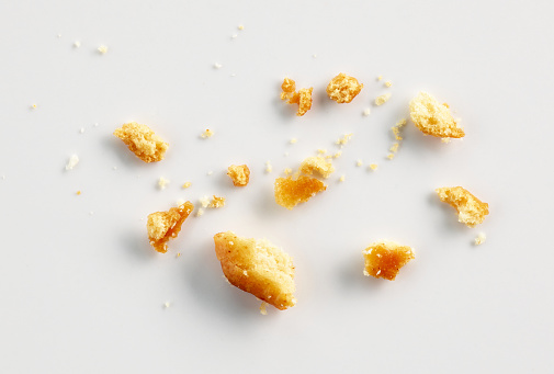 bread crumbs on white background