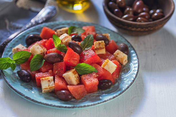 Watermelon salad with grilled halloumi cheese on a plate