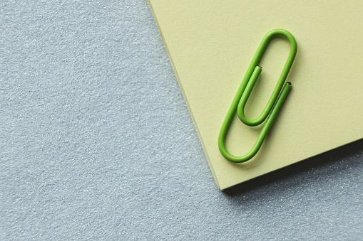 Paper clip on adhesive note