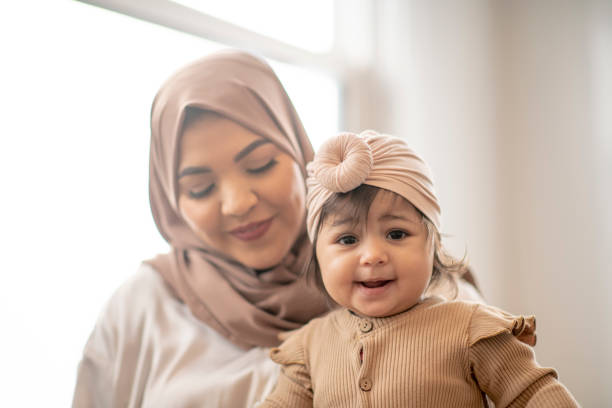 istock Muslim Mother and her Baby 1401424725