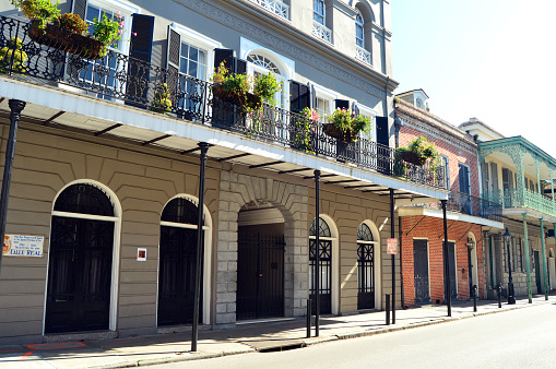 Historic buildings line the street in the beautiful French Quarter district of New Orleans