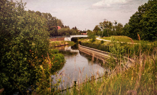 istock Rural canal and fields in Holland 1401429290