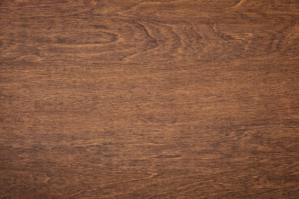istock dark wood grain, brown board with a natural pattern. wooden background 1401432687