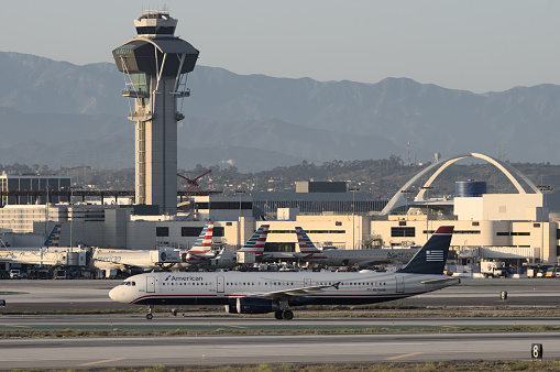 Los Angeles International Airport, California, USA - April 23, 2022: image of American Airlines Airbus A321-231 with registration N578UW shown taxiing after landing. Plane painted in US Airways heritage livery.