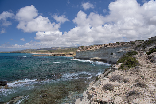 View from the Agios Georgios (St. George) area with waves breaking along expansive coastal shoreline at the beginning of Akamas in Cyprus. Nikon D750 with Nikon 24-70mm ED VR zoom lens.