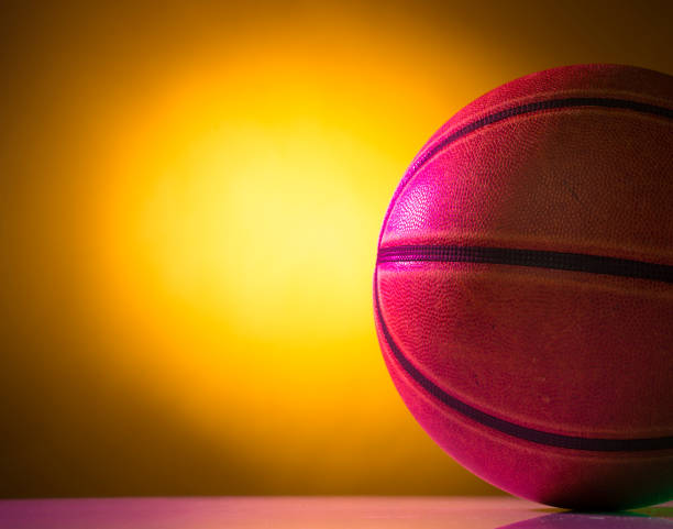 istock basketball ball on a colorful background close-up isolated with empty space for text 1401436159