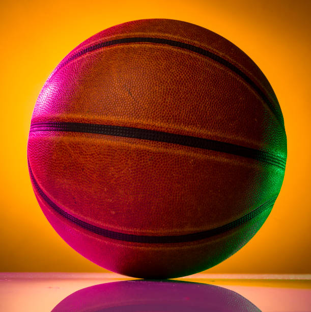 istock basketball ball on a colorful background close-up isolated with empty space for text 1401436180