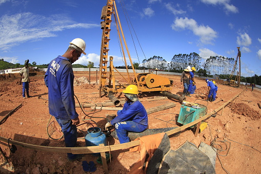 ilheus, bahia, brazil - may 23, 2022: pile driving equipment during foundations in a construction in the city of Ilheus.