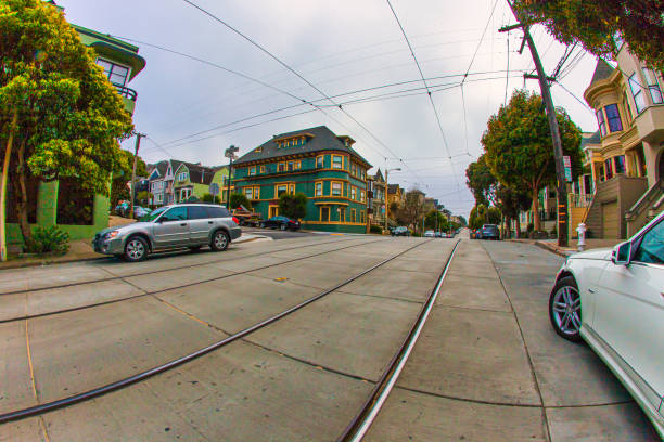 San Francisco, California, USA - April 12, 2024: Cable Car at Powell Street against cloudy sky