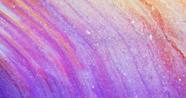istock sparkling fluid texture glitter ink flow purple 1401437041
