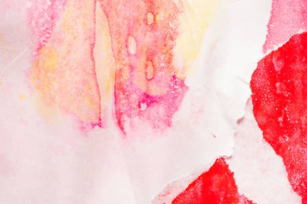 istock Abstract red watercolor paint on torn paper background texture 1401437645