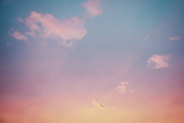 istock Sunset sky with few purple clouds, sky only background 1401439031